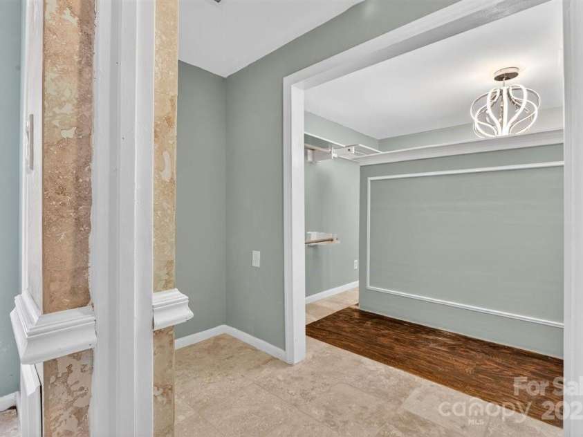 7144 Chapparall Lane, Charlotte, NC 28215.  MLS# CAR4288471, YatesRealty ID 33729. Entryway to Oversized Walkin Closet