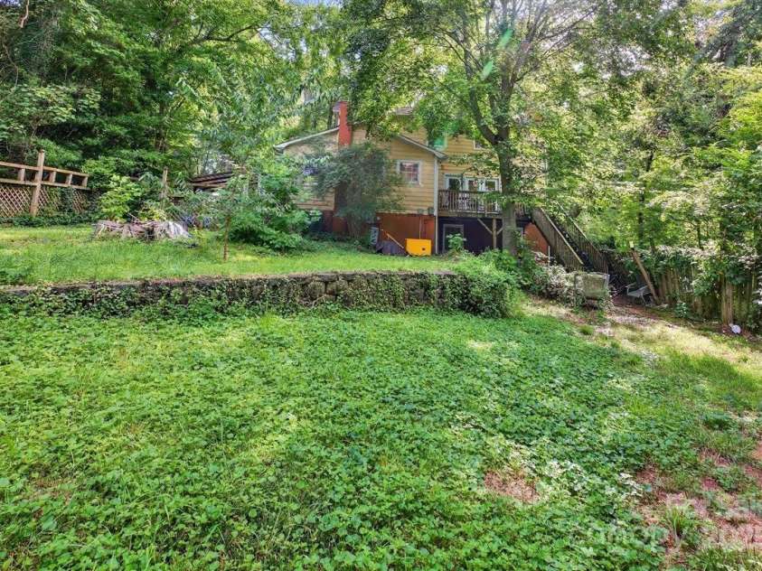 7144 Chapparall Lane, Charlotte, NC 28215.  MLS# CAR4288471, YatesRealty ID 33729. Large Backyard