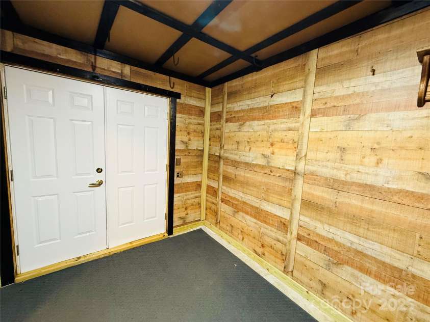 130 Nims Spring Drive, Fort Mill, SC 29715.  MLS# CAR4272422, YatesRealty ID 33730. Basement Workshop