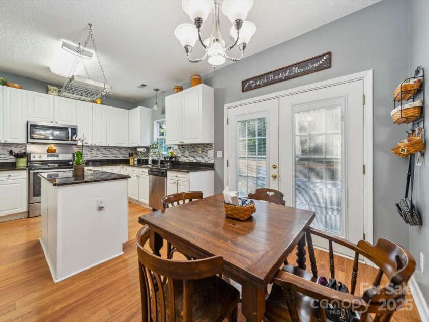 130 Nims Spring Drive, Fort Mill, SC 29715.  MLS# CAR4272422, YatesRealty ID 33730. Kitchen and eating area