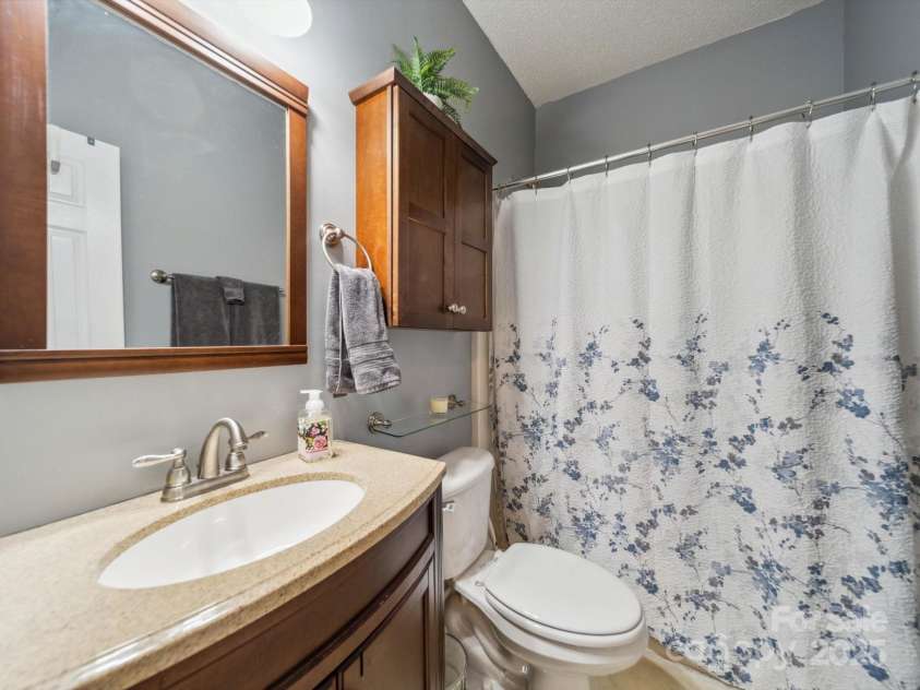 130 Nims Spring Drive, Fort Mill, SC 29715.  MLS# CAR4272422, YatesRealty ID 33730. Mail level full bath