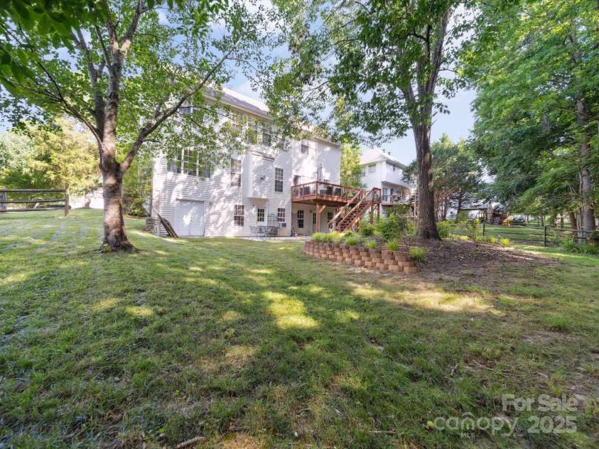 130 Nims Spring Drive, Fort Mill, SC 29715.  MLS# CAR4272422, YatesRealty ID 33730. Rear Exterior