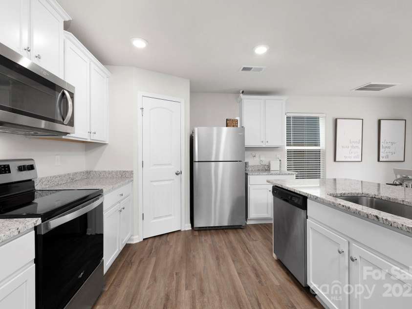 9025 Creedmore Hills Drive, Charlotte, NC 28214.  MLS# CAR4289266, YatesRealty ID 33732. Kitchen with Stainless Steel Appliances