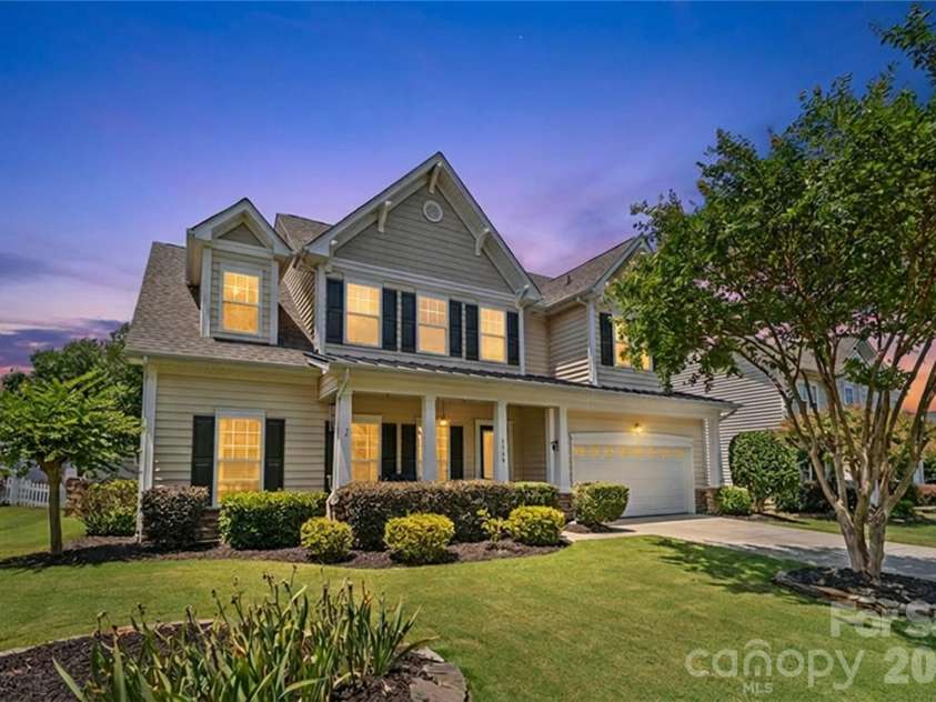 3560 Valiant Avenue, Concord, NC 28027.  MLS# CAR4397754, YatesRealty ID 33733. Evening.. so much curb appeal