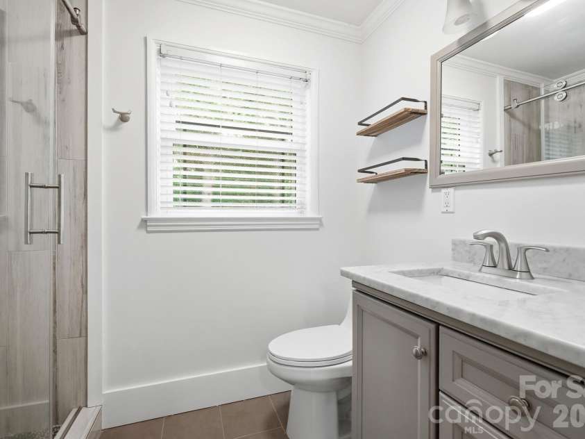 5108 White Oak Road, Charlotte, NC 28210.  MLS# CAR4393738, YatesRealty ID 33735. 2nd Full Bathroom Downstairs 
