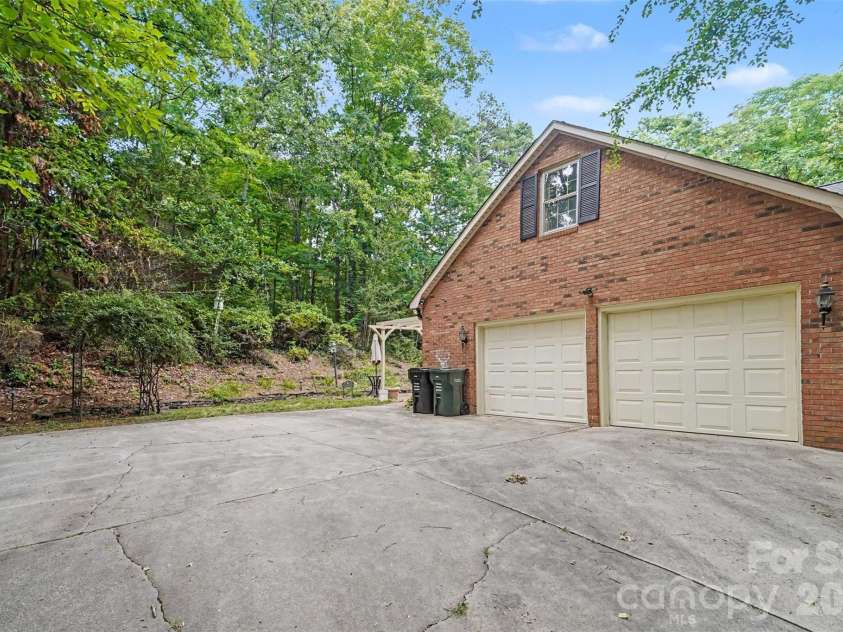 215 Chedworth Court, Concord, NC 28025.  MLS# CAR4396675, YatesRealty ID 33737. 2 car side load garage