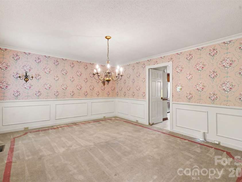 215 Chedworth Court, Concord, NC 28025.  MLS# CAR4396675, YatesRealty ID 33737. Formal dining room