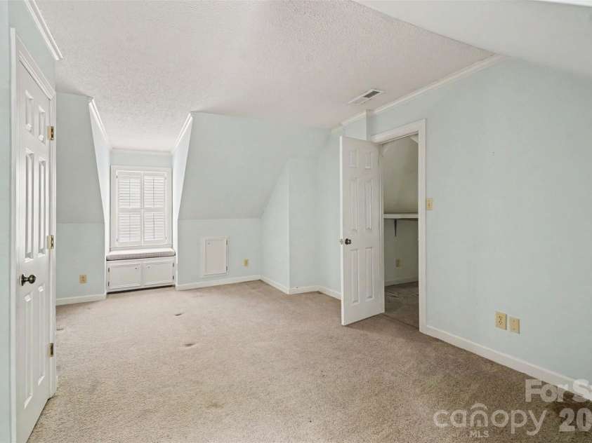 215 Chedworth Court, Concord, NC 28025.  MLS# CAR4396675, YatesRealty ID 33737. Secondary bedroom upstairs