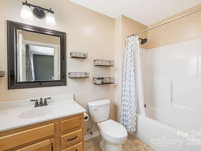 742 Old NC 20 Highway, Alexander, NC 28701.  MLS# CAR4249395, YatesRealty ID 33751. Primary en-suite