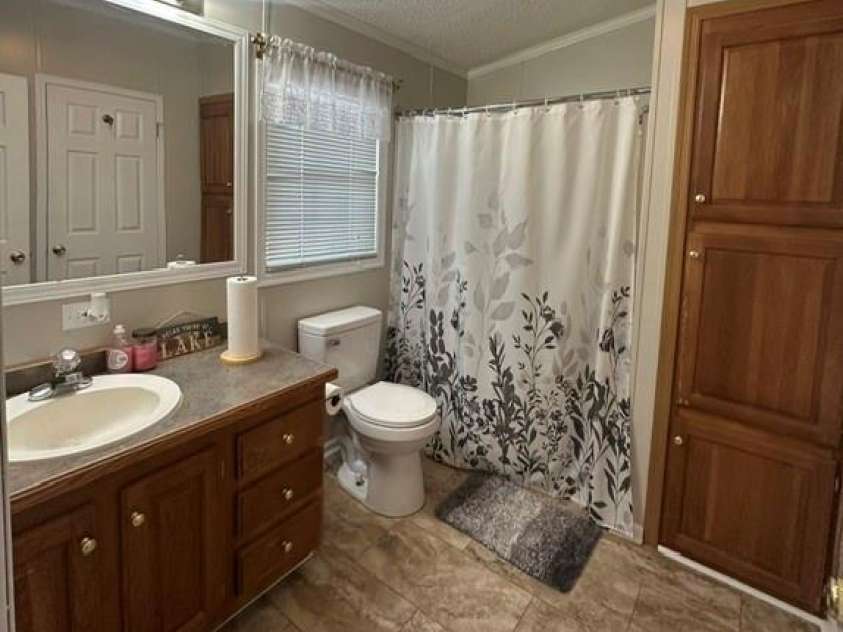 143 Cardinal Drive, New London, NC 28127.  MLS# CAR4393839, YatesRealty ID 33756. 