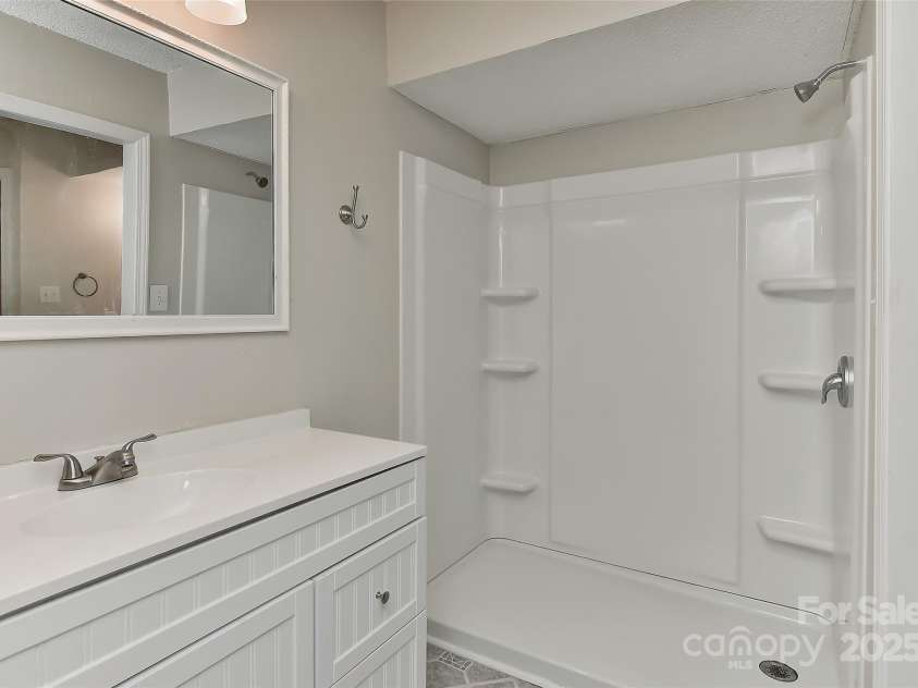 6500 Clavell Lane, Charlotte, NC 28210.  MLS# CAR4289455, YatesRealty ID 33760. Full bath 2 with newly installed shower 2023!