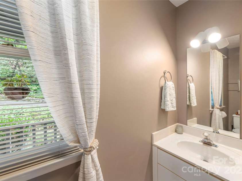 11 Claremont Drive, Flat Rock, NC 28731.  MLS# CAR4289127, YatesRealty ID 33763. First Floor Powder Room