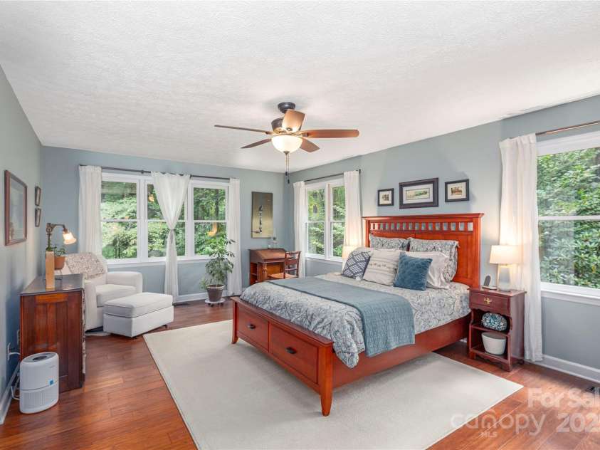 11 Claremont Drive, Flat Rock, NC 28731.  MLS# CAR4289127, YatesRealty ID 33763. First Floor Primary Bedroom