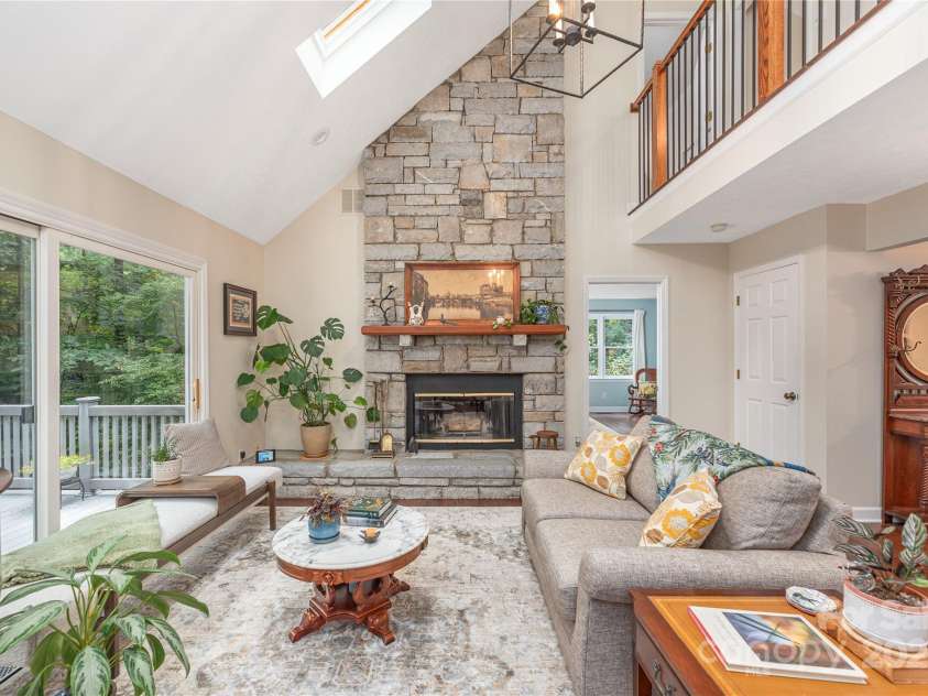 11 Claremont Drive, Flat Rock, NC 28731.  MLS# CAR4289127, YatesRealty ID 33763. Stone Fireplace