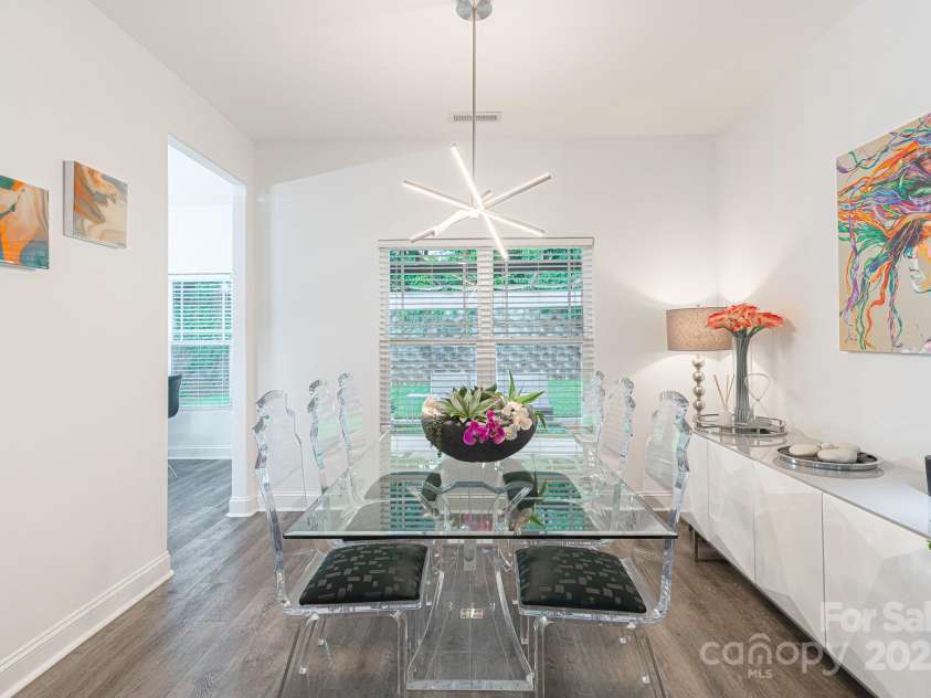 6402 Colonial Garden Drive, Huntersville, NC 28078.  MLS# CAR4291074, YatesRealty ID 33770. Dining room overlooking private backyard.