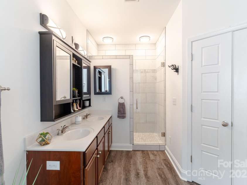 6402 Colonial Garden Drive, Huntersville, NC 28078.  MLS# CAR4291074, YatesRealty ID 33770. Frameless walk-in shower.