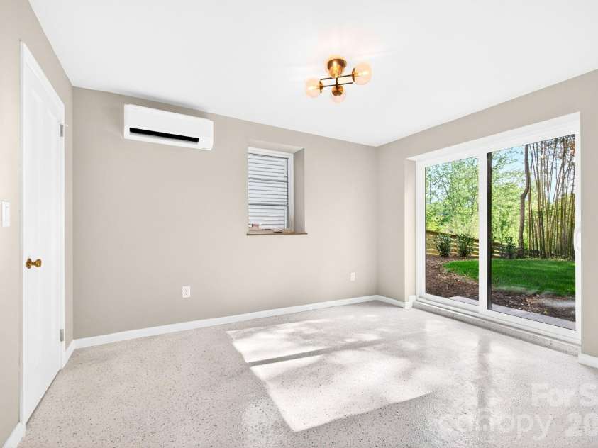 4 Baird Lane, Asheville, NC 28804.  MLS# CAR4380981, YatesRealty ID 33771. Basement Bedroom