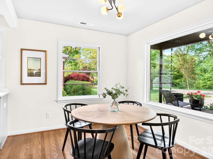 4 Baird Lane, Asheville, NC 28804.  MLS# CAR4380981, YatesRealty ID 33771. Dining Area w/ large Window Overlooking Front Porch