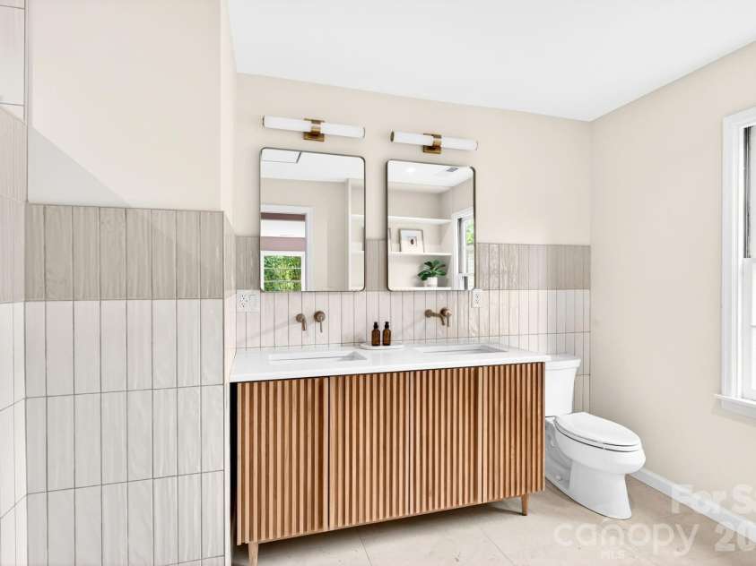 4 Baird Lane, Asheville, NC 28804.  MLS# CAR4380981, YatesRealty ID 33771. Double Vanity in Primary Bathroom