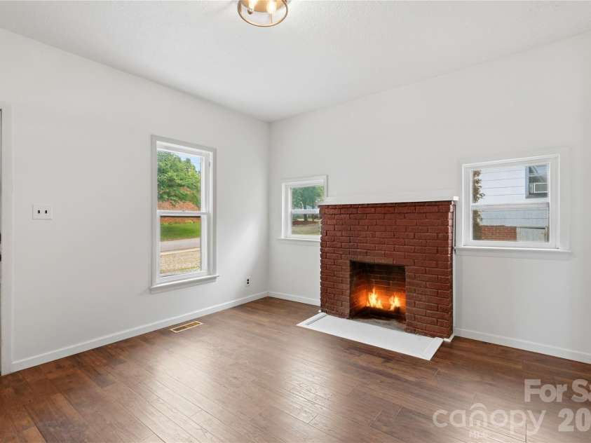 1013 7th Street, Hickory, NC 28601.  MLS# CAR4396981, YatesRealty ID 33773. Virtual fire added for illustrative purposes