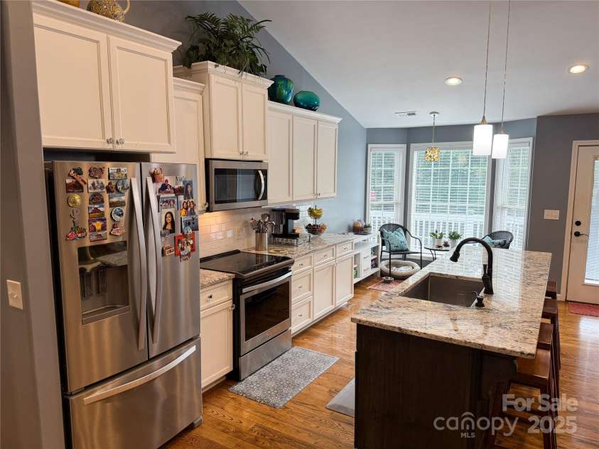 2302 Saratoga Run, Morganton, NC 28655.  MLS# CAR4292402, YatesRealty ID 33773. Kitchen, complete with island and breakfast nook