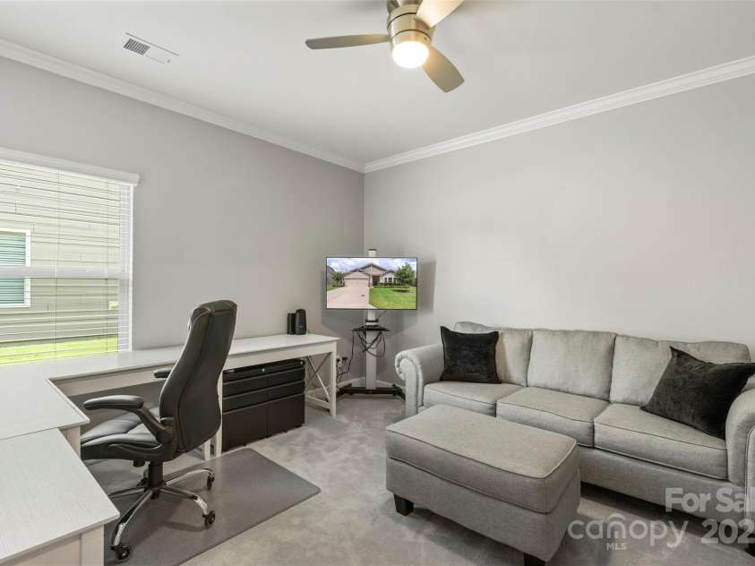 5012 Laurel Glen Court, Monroe, NC 28110.  MLS# CAR4292898, YatesRealty ID 33778. Flex Room, currently being used as an office, very easy to add a closet and a door to create a 4th Bedroom