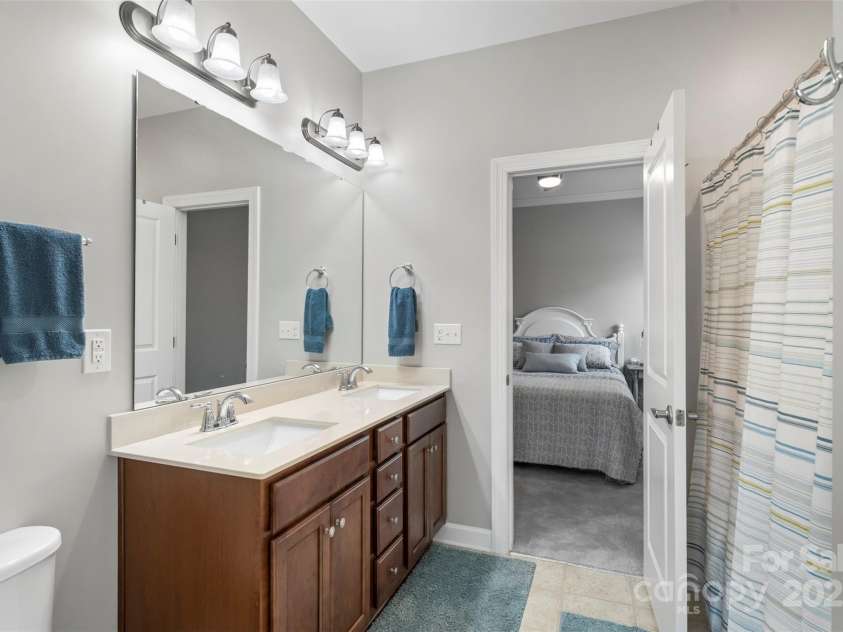 5012 Laurel Glen Court, Monroe, NC 28110.  MLS# CAR4292898, YatesRealty ID 33778. The Secondary Bedrooms both have access to the bath