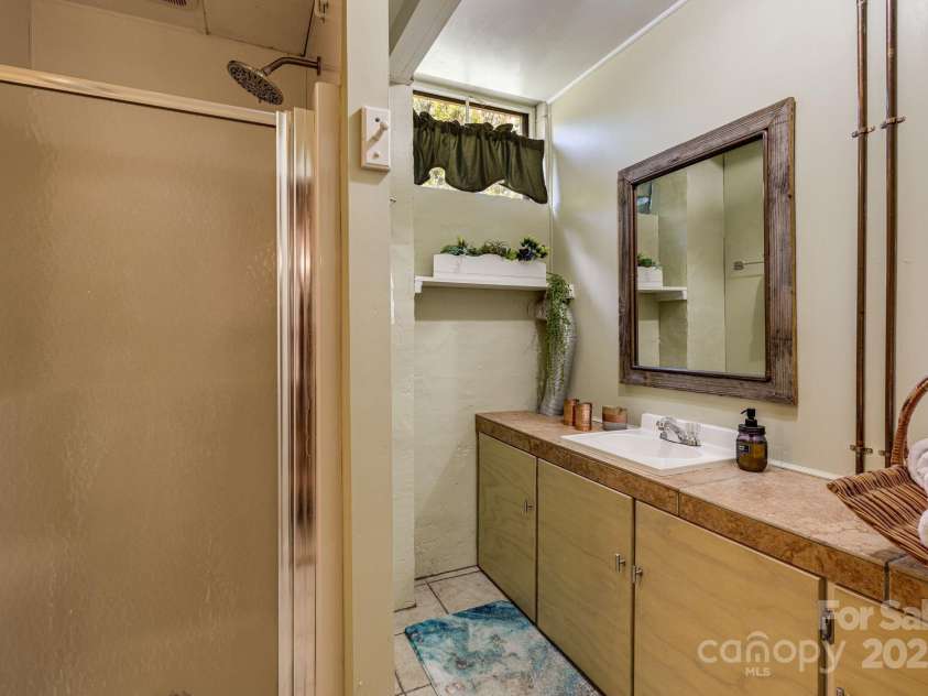 1115 Bee Tree Road, Swannanoa, NC 28778.  MLS# CAR4293504, YatesRealty ID 33782. Basement Apartment BAthroom
