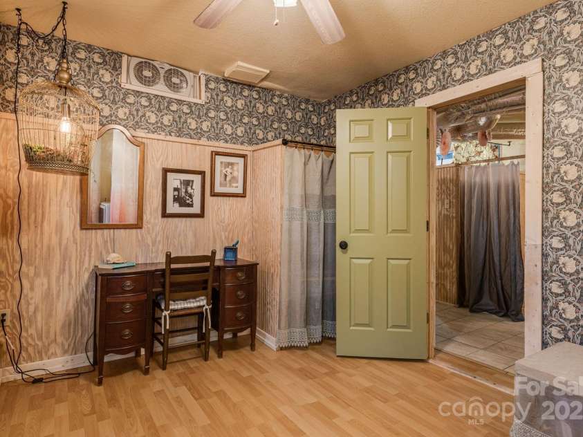 1115 Bee Tree Road, Swannanoa, NC 28778.  MLS# CAR4293504, YatesRealty ID 33782. Basement Apartment Bedroom