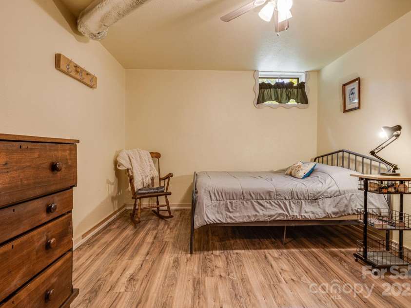 1115 Bee Tree Road, Swannanoa, NC 28778.  MLS# CAR4293504, YatesRealty ID 33782. Basement Apartment Flex Space