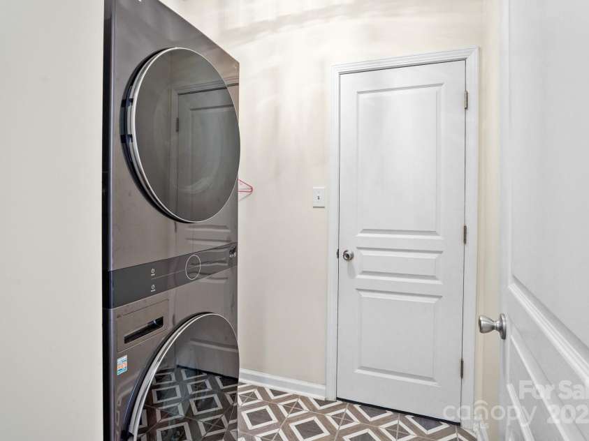 10636 Secret Garden Lane, Charlotte, NC 28214.  MLS# CAR4293373, YatesRealty ID 33785. Main-level laundry for true convenience