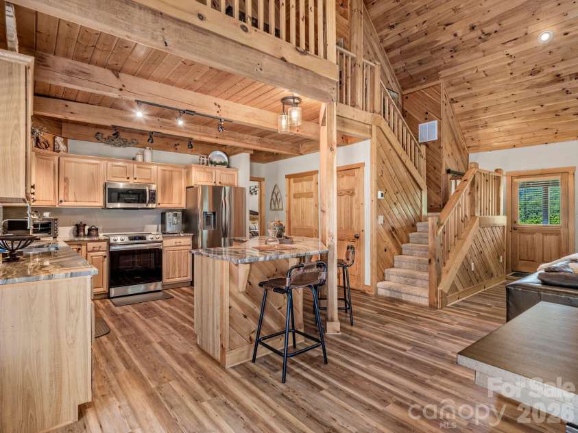 59 Canoe Creek Drive, Tuckasegee, NC 28783.  MLS# CAR4396318, YatesRealty ID 33786. 
