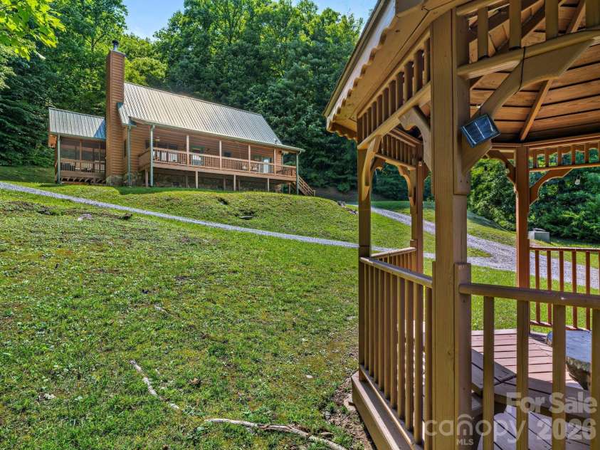 59 Canoe Creek Drive, Tuckasegee, NC 28783.  MLS# CAR4396318, YatesRealty ID 33786. 