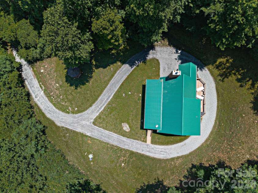 59 Canoe Creek Drive, Tuckasegee, NC 28783.  MLS# CAR4396318, YatesRealty ID 33786. 