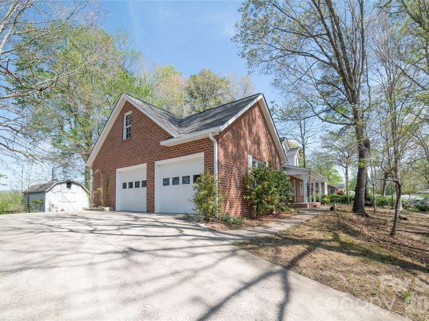 1421 Windsor Street, Lenoir, NC 28645.  MLS# CAR4372001, YatesRealty ID 33788. Garage and storage shed