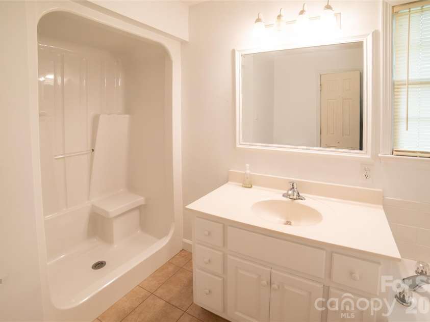 1421 Windsor Street, Lenoir, NC 28645.  MLS# CAR4372001, YatesRealty ID 33788. Primary bath with separate shower