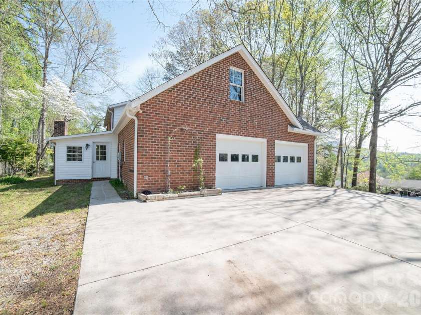 1421 Windsor Street, Lenoir, NC 28645.  MLS# CAR4372001, YatesRealty ID 33788. Side view, enclosed patio