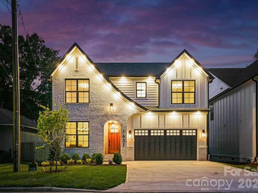 1637 Longfellow Street, Charlotte, NC 28205.  MLS# CAR4346623, YatesRealty ID 3379. Front view at twilight.