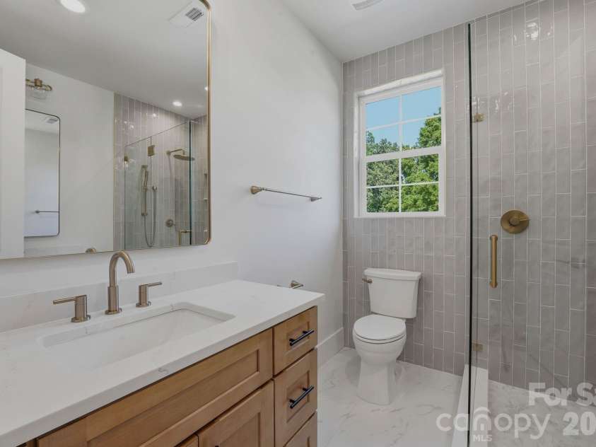 1637 Longfellow Street, Charlotte, NC 28205.  MLS# CAR4346623, YatesRealty ID 3379. Jack and Jill bathroom.