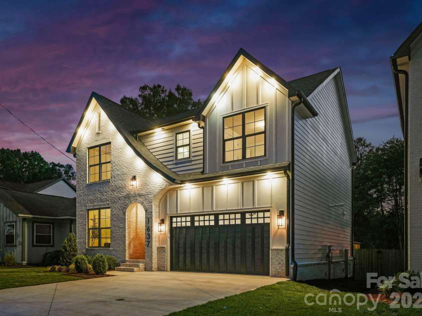1637 Longfellow Street, Charlotte, NC 28205.  MLS# CAR4346623, YatesRealty ID 3379. Side view at twilight.