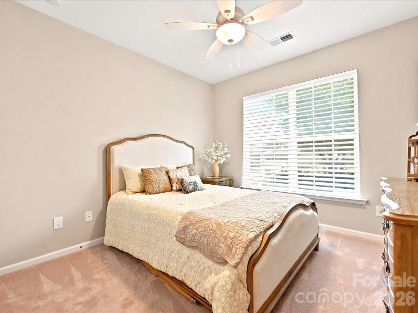1726 Tailed Hawk Way, Fort Mill, SC 29715.  MLS# CAR4394570, YatesRealty ID 33796. Guest suite with ceiling fan
