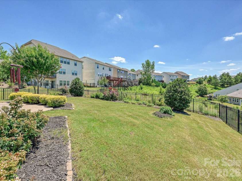 1726 Tailed Hawk Way, Fort Mill, SC 29715.  MLS# CAR4394570, YatesRealty ID 33796. Rear yard with no direct neighbor behind