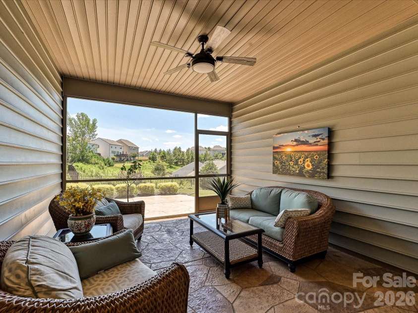 1726 Tailed Hawk Way, Fort Mill, SC 29715.  MLS# CAR4394570, YatesRealty ID 33796. Screened porch with ceiling fan