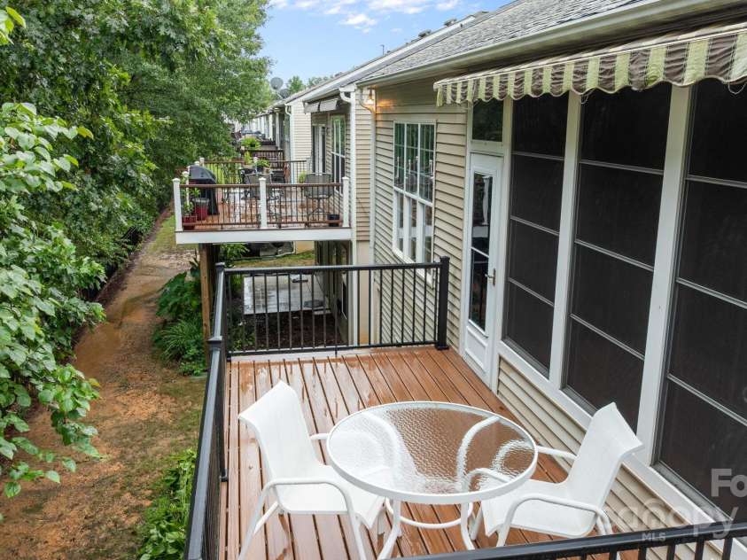 17517 Hawks View Drive, Fort Mill, SC 29707.  MLS# CAR4287390, YatesRealty ID 33796. Beautiful deck overlooking trees in  backyard