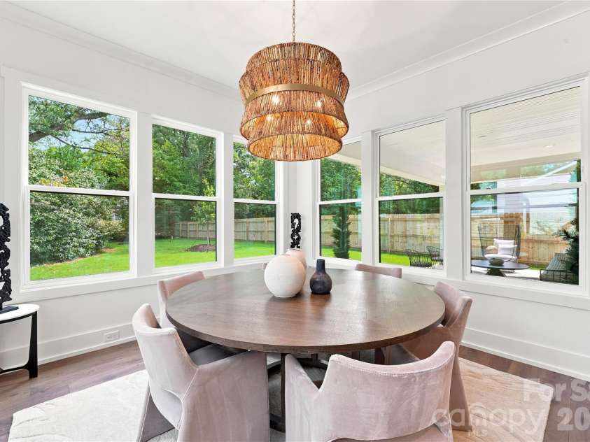 4337 Castleton Road, Charlotte, NC 28211.  MLS# CAR4329159, YatesRealty ID 33798. Bright and airy dining room with a view of the back yard.