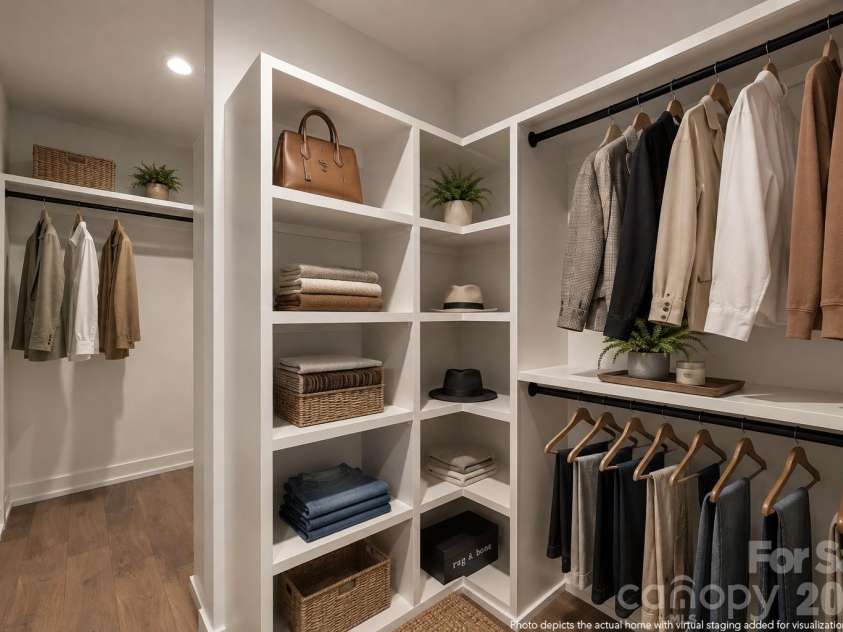 4337 Castleton Road, Charlotte, NC 28211.  MLS# CAR4329159, YatesRealty ID 33798. Primary walk in closet- This photo is digitally enhanced.