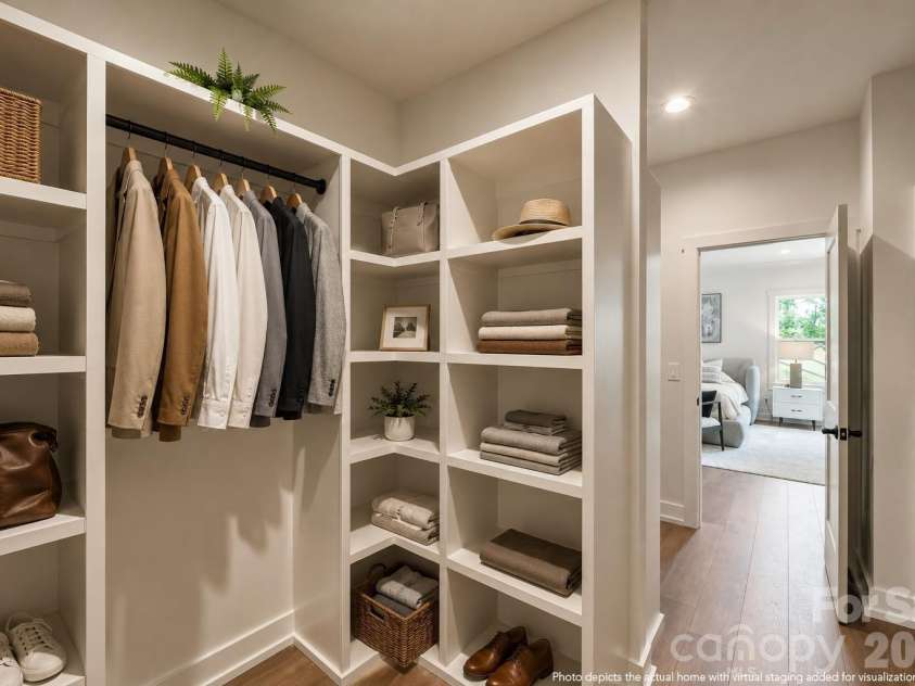 4337 Castleton Road, Charlotte, NC 28211.  MLS# CAR4329159, YatesRealty ID 33798. Primary walk in closet- This photo is digitally enhanced.