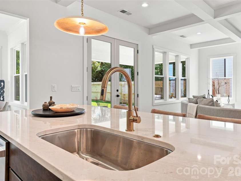 4337 Castleton Road, Charlotte, NC 28211.  MLS# CAR4329159, YatesRealty ID 33798. The kitchen over looking the great room