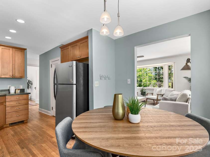 21 Clairmont Avenue, Asheville, NC 28804.  MLS# CAR4251719, YatesRealty ID 33799. Welcoming open floorplan connects living, dining, and kitchen