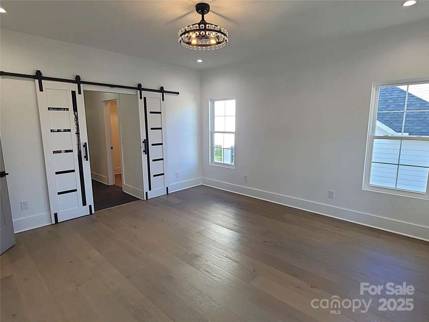 405 19th Avenue Circle, Hickory, NC 28601.  MLS# CAR4201802, YatesRealty ID 338. Primary bedroom